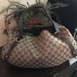 Gucci bag (purse).